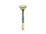 Yellow gold Princess Cut Diamond Solitaire Ring with Round with Blue Topaz side stone Pavé Band and Four-Prong Setting_38