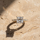 Yellow gold Princess Cut Diamond Solitaire with Side Baguettes and Channel Set Band_70