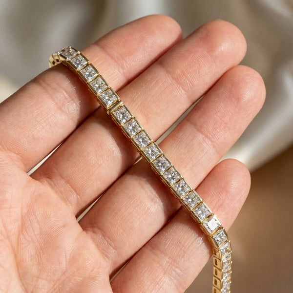 Yellow gold Princess Cut Diamond Tennis Bracelet with Channel Setting