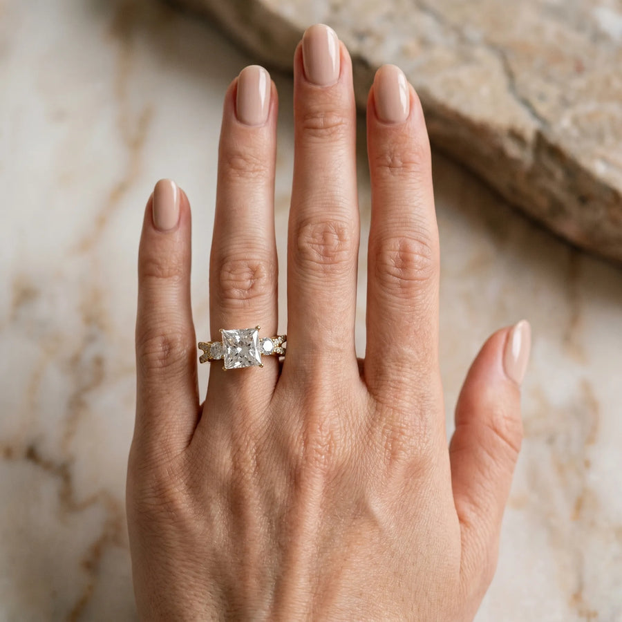 Yellow gold Princess Cut Diamond Three-Stone Ring with Pavé Split Shank and Four-Prong Setting