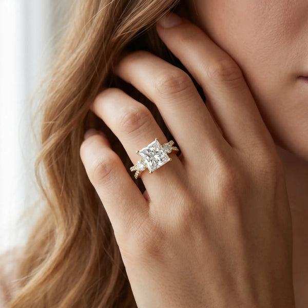 Yellow gold Princess Cut Diamond Three-Stone Ring with Pavé Split Shank and Four-Prong Setting