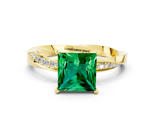 Yellow gold Princess Cut Emerald Engagement Ring with Side Stone Accents and Four-Prong Setting