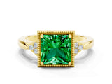 Yellow gold Princess Cut Emerald Halo Ring with Tapered Band and Four-Prong Setting