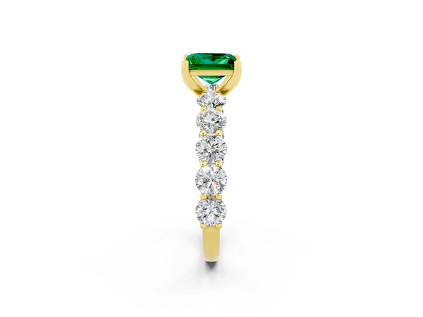 Yellow gold Princess Cut Emerald Prong Setting with Side Stones on a Pave Band