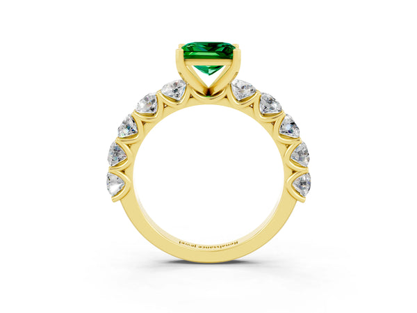 Yellow gold Princess Cut Emerald Prong Setting with Side Stones on a Pave Band