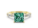 Yellow gold Princess Cut Green Sapphire Solitaire with Side Baguettes and Channel Set Band