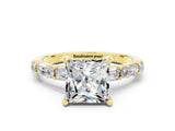 Yellow gold Princess Cut Moissanite Solitaire with Side Baguettes and Channel Set Band