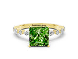 Yellow gold Princess Cut Peridot Solitaire with Side Stones on a Pavé Band and Four-Prong Setting