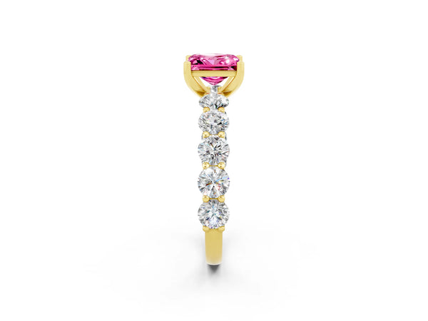Yellow gold Princess Cut Pink Sapphire Prong Setting with Side Stones on a Pave Band