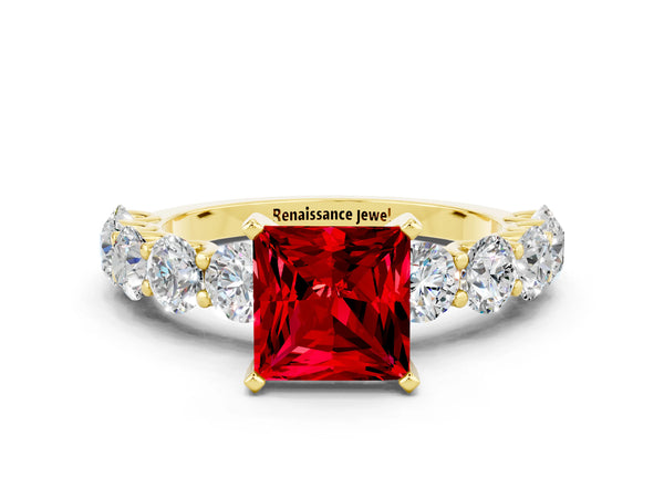 Yellow gold Princess Cut Ruby Prong Setting with Side Stones on a Pave Band