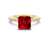 Yellow gold Princess Cut Ruby Solitaire Engagement Ring with Pavé Band and Four-Prong Setting