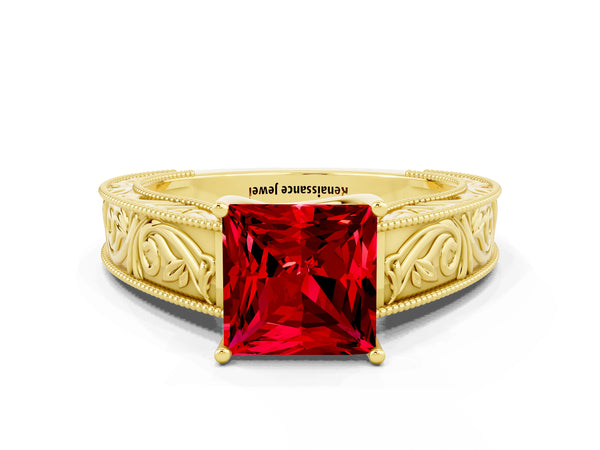 Yellow gold Princess Cut Ruby Solitaire Ring with Engraved Band and Four-Prong Setting