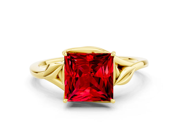 Yellow gold Princess Cut Ruby Solitaire Ring with Twist Band and Four-Prong Setting