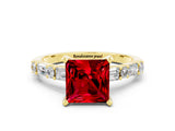 Yellow gold Princess Cut Ruby Solitaire with Side Baguettes and Channel Set Band