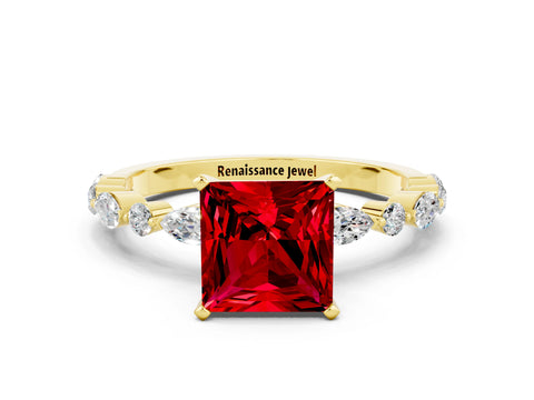 Yellow gold Princess Cut Ruby Solitaire with Side Stones on a Pavé Band and Four-Prong Setting