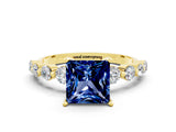 Yellow gold Princess Cut Solitaire Blue Sapphire Ring with Pave Band and Four-Prong Setting