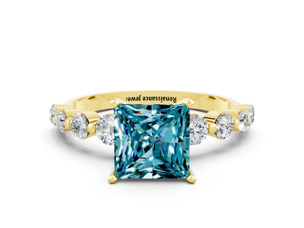 Yellow gold Princess Cut Solitaire Blue Topaz Ring with Pave Band and Four-Prong Setting