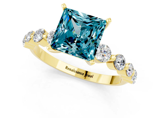 Yellow gold Princess Cut Solitaire Blue Topaz Ring with Pave Band and Four-Prong Setting