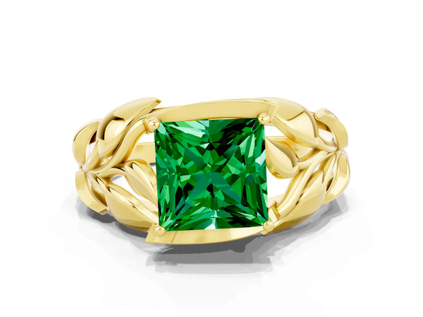 Yellow gold Princess Cut Emerald Leaf-Inspired Engagement Ring with Round Accents and Prong Setting