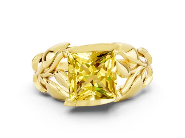 Yellow gold Princess Cut Yellow Sapphire Leaf-Inspired Engagement Ring with Round Accents and Prong Setting