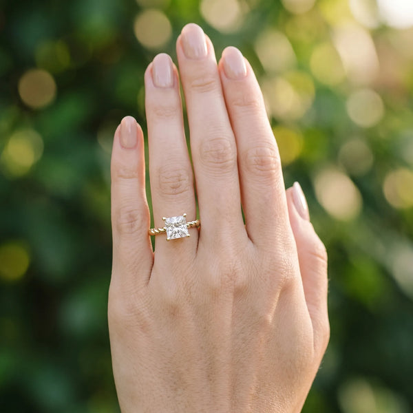 Yellow gold Princess Cut Solitaire Twisted Band Ring with Four-Prong Setting
