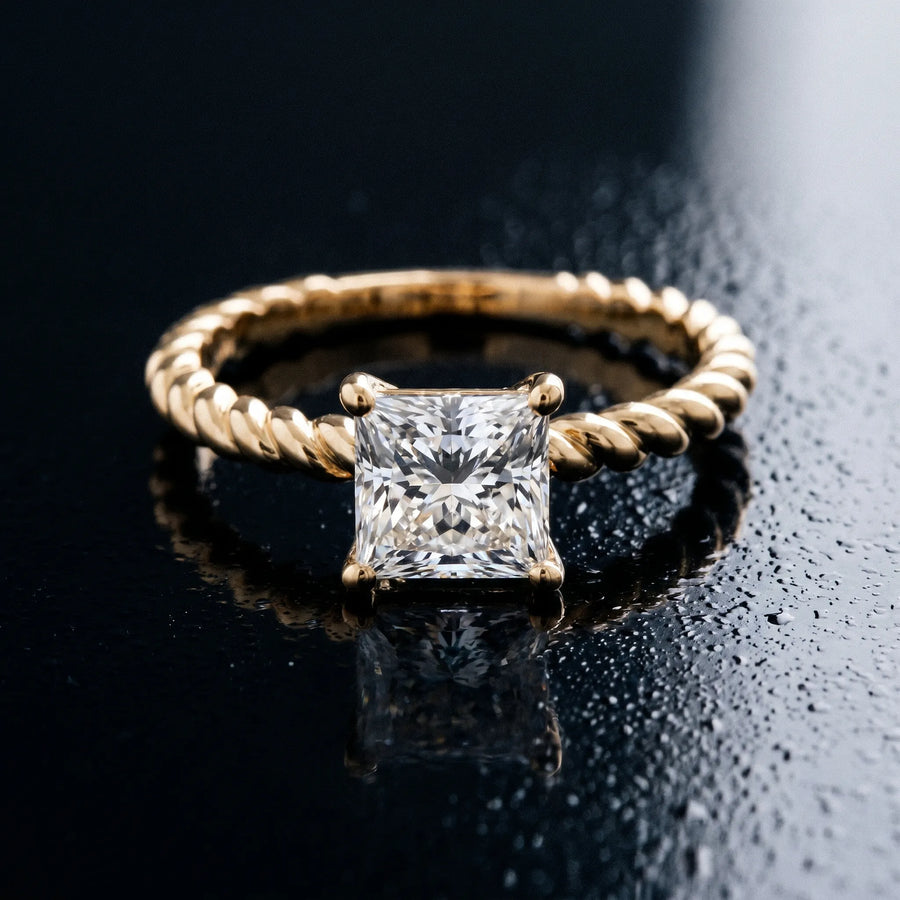Yellow gold Princess Cut Solitaire Twisted Band Ring with Four-Prong Setting