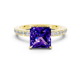Yellow gold Princess Cut Tanzanite Solitaire Engagement Ring with Pavé Band and Four-Prong Setting