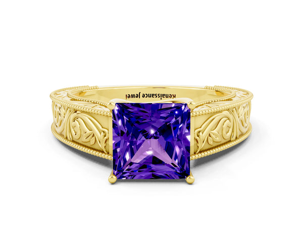 Yellow gold Princess Cut Tanzanite Solitaire Ring with Engraved Band and Four-Prong Setting