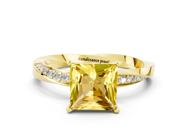 Yellow gold Princess Cut Yellow Sapphire Engagement Ring with Side Stone Accents and Four-Prong Setting
