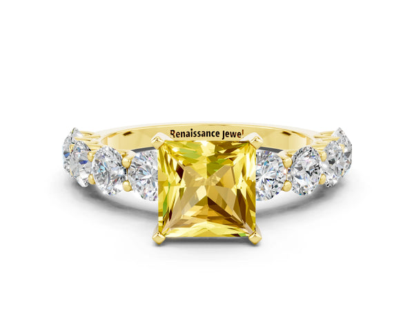 Yellow gold Princess Cut Yellow Sapphire Prong Setting with Side Stones on a Pave Band
