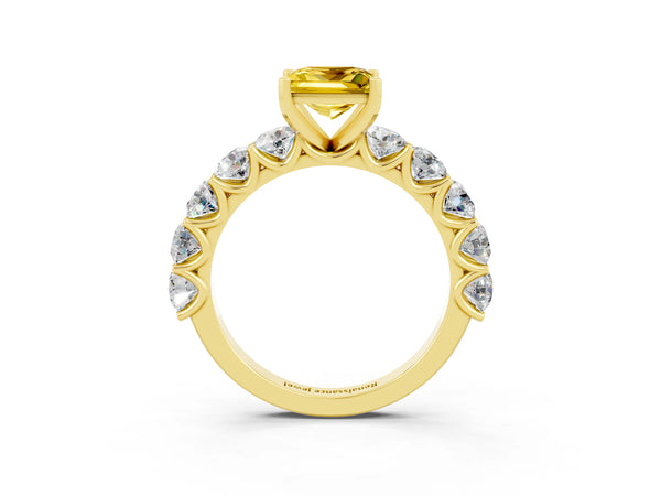 Yellow gold Princess Cut Yellow Sapphire Prong Setting with Side Stones on a Pave Band