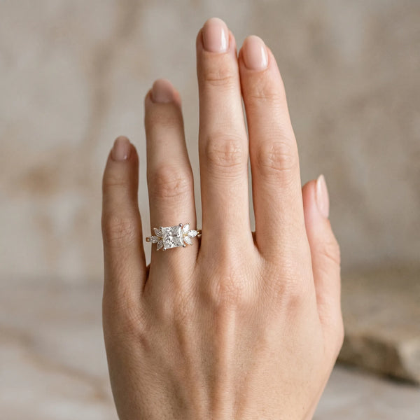 Yellow gold Princess Diamond Floral Cluster Ring with Marquise Side Stones and Six-Prong Solitaire Setting