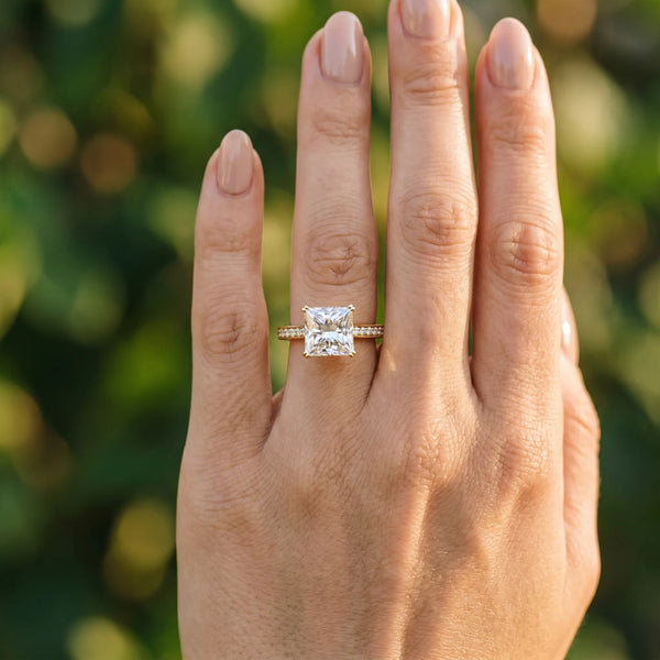 Yellow gold Princess Diamond Solitaire with Pave Band and Six-Prong Setting
