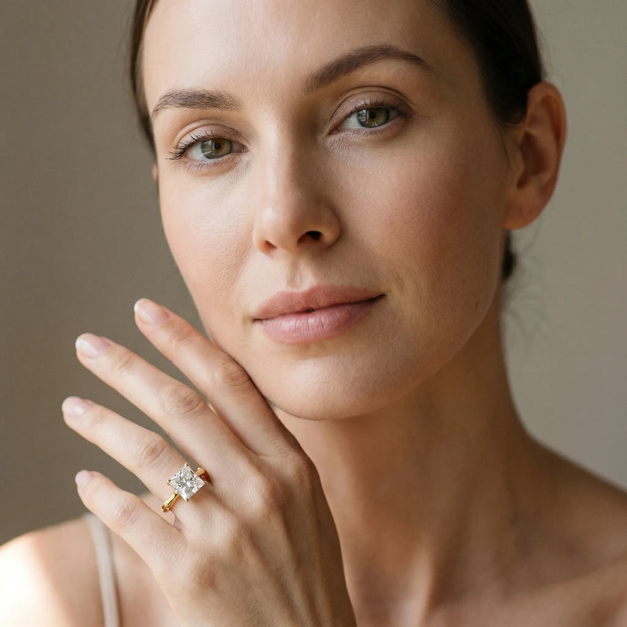 Yellow gold Princess Solitaire Diamond Ring with Bamboo Band and Four-Prong Setting