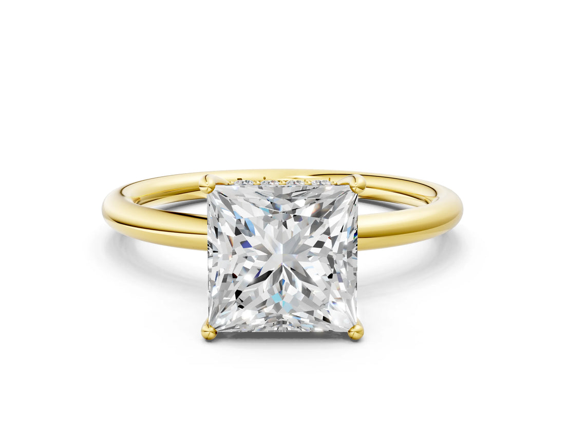 Yellow gold Princess Solitaire Diamond Ring with a Classic Band and Four-Prong Setting