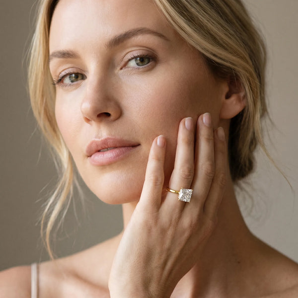 Yellow gold Princess Solitaire Engagement Ring with Cathedral Band and Four-Prong Setting