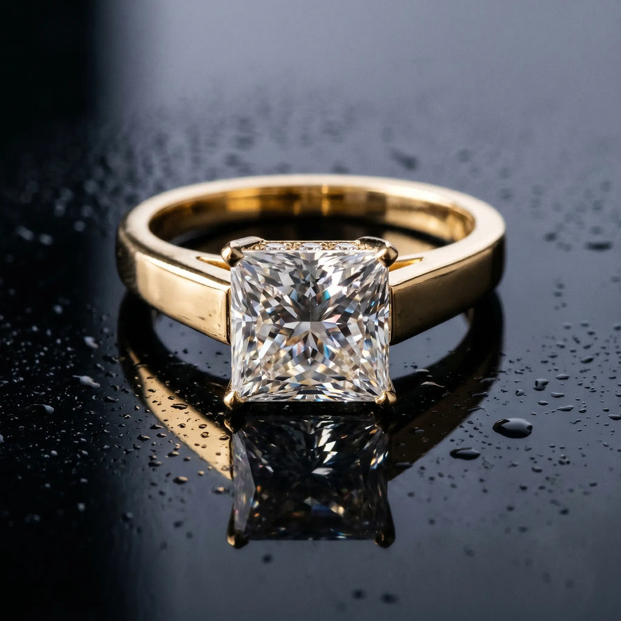 Yellow gold Princess Solitaire Engagement Ring with Four-Prong Setting and Tapered Band