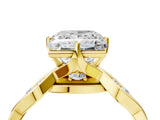 Yellow gold Princess Solitaire Twist Band with Leaf Prong Setting 5
