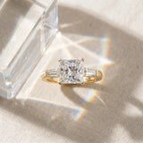 Yellow gold Princess Solitaire with Tapered Baguette Side Stones on a Classic Band with Four-Prong Setting_16
