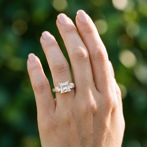 Yellow gold Princess Three-Stone Diamond Ring with Pavé Band and Four-Prong Setting