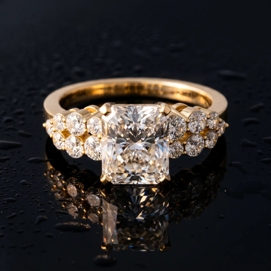Yellow gold Radiant Cluster Diamond Engagement Ring with Pavé Band and Four-Prong Setting