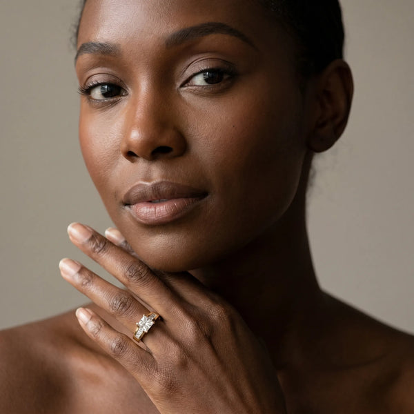 Yellow gold Radiant Cut Channel Set Solitaire Ring with Four-Prong Setting