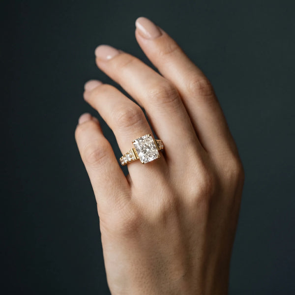 Yellow gold Radiant Cut Diamond Classic Solitaire Ring with Pavé Band and Four-Prong Setting