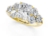 Yellow gold Radiant Cut Diamond Cluster Ring with Round Accent Stones and Prong Setting on a Classic Band_62
