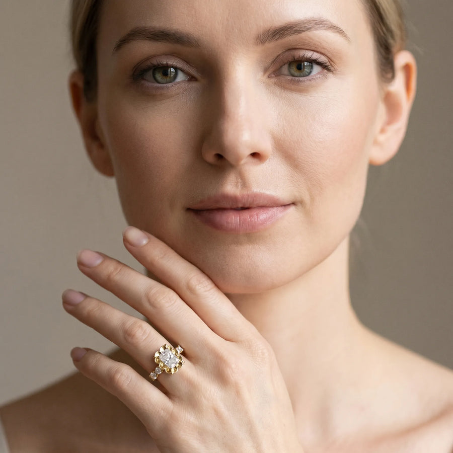 Yellow gold Radiant Cut Diamond Floral Halo Engagement Ring with Shared Prong Setting