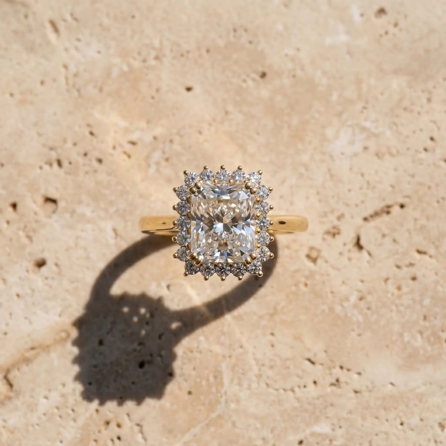 Yellow gold Radiant Cut Diamond Halo Ring with Solitaire Band and Prong Setting
