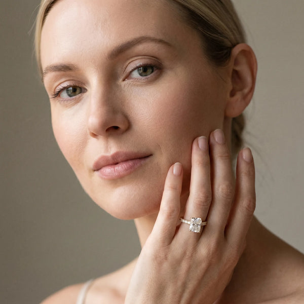 Yellow gold Radiant Cut Diamond Pavé Band Solitaire Ring with Prong Setting