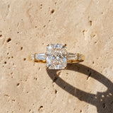 Yellow gold Radiant Cut Diamond Ring with Baguette Side Stones, Channel Set Band, and Four-Prong Setting_16