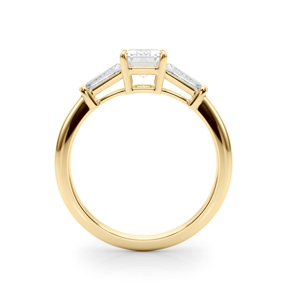 Yellow gold Radiant Cut Diamond Ring with Tapered Baguette Side Stones on a Platinum Band with Four-Prong Setting