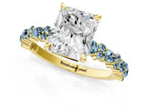 Yellow gold Radiant Cut Diamond Side Stone Solitaire Ring with Round with Aquamarine side stone and Four-Prong Setting_1